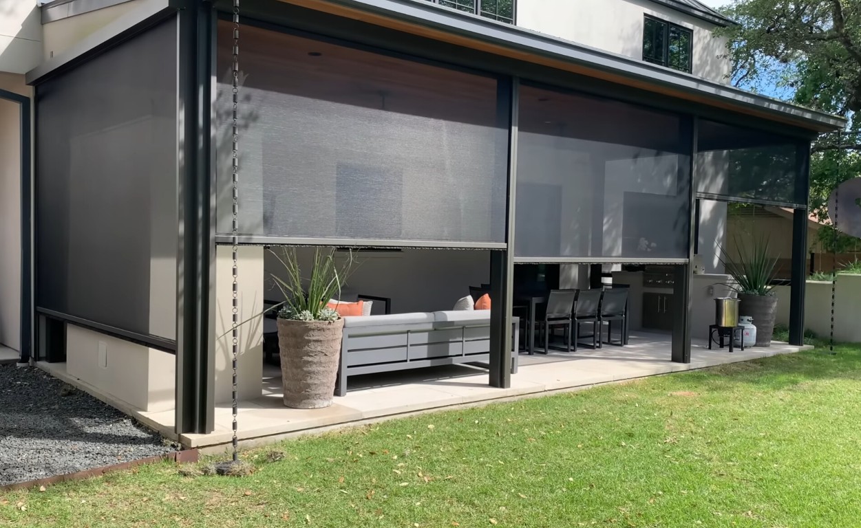 Modern patio enclosure with retractable screens in Kendall, FL